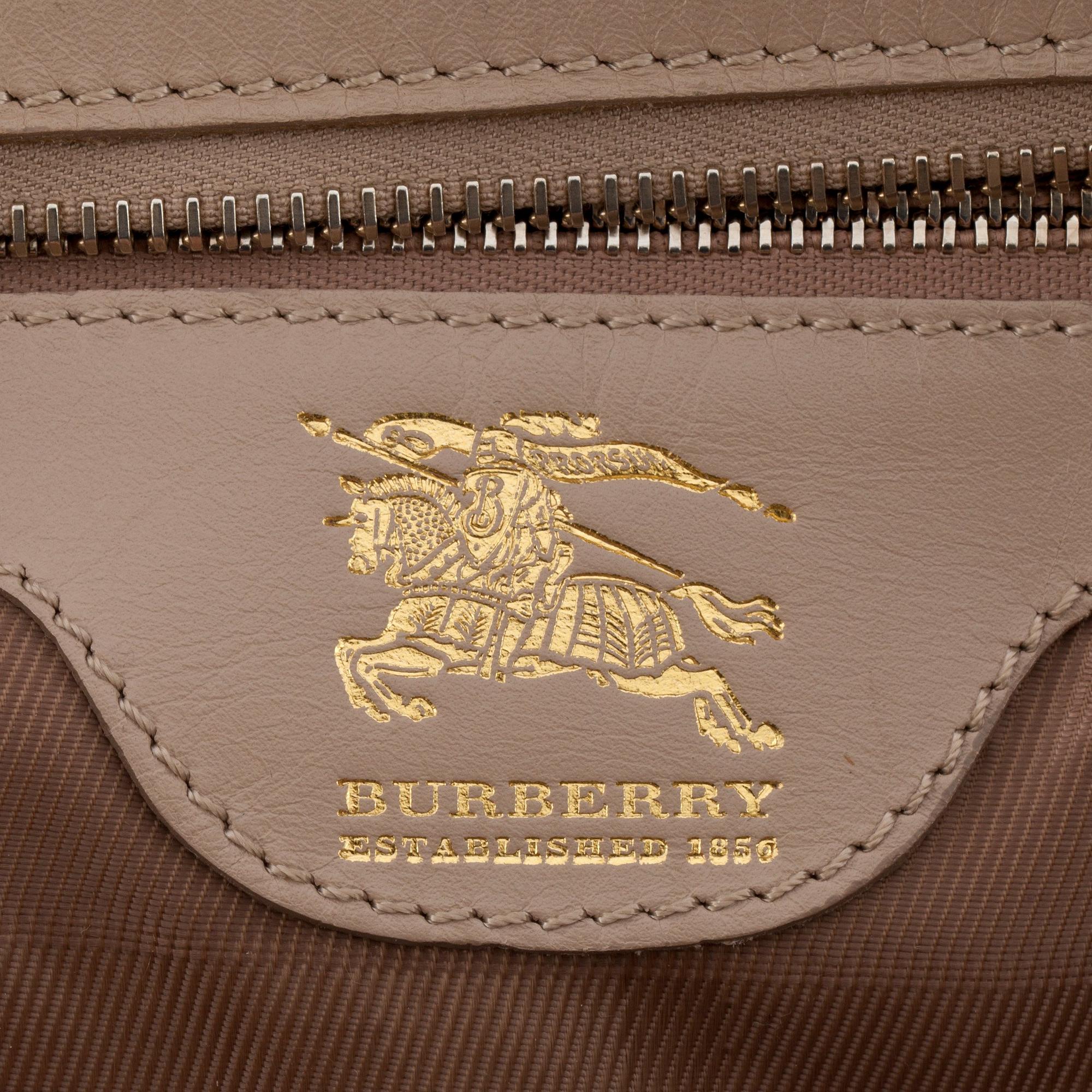 BURBERRY, a beige leather shoulder bag.