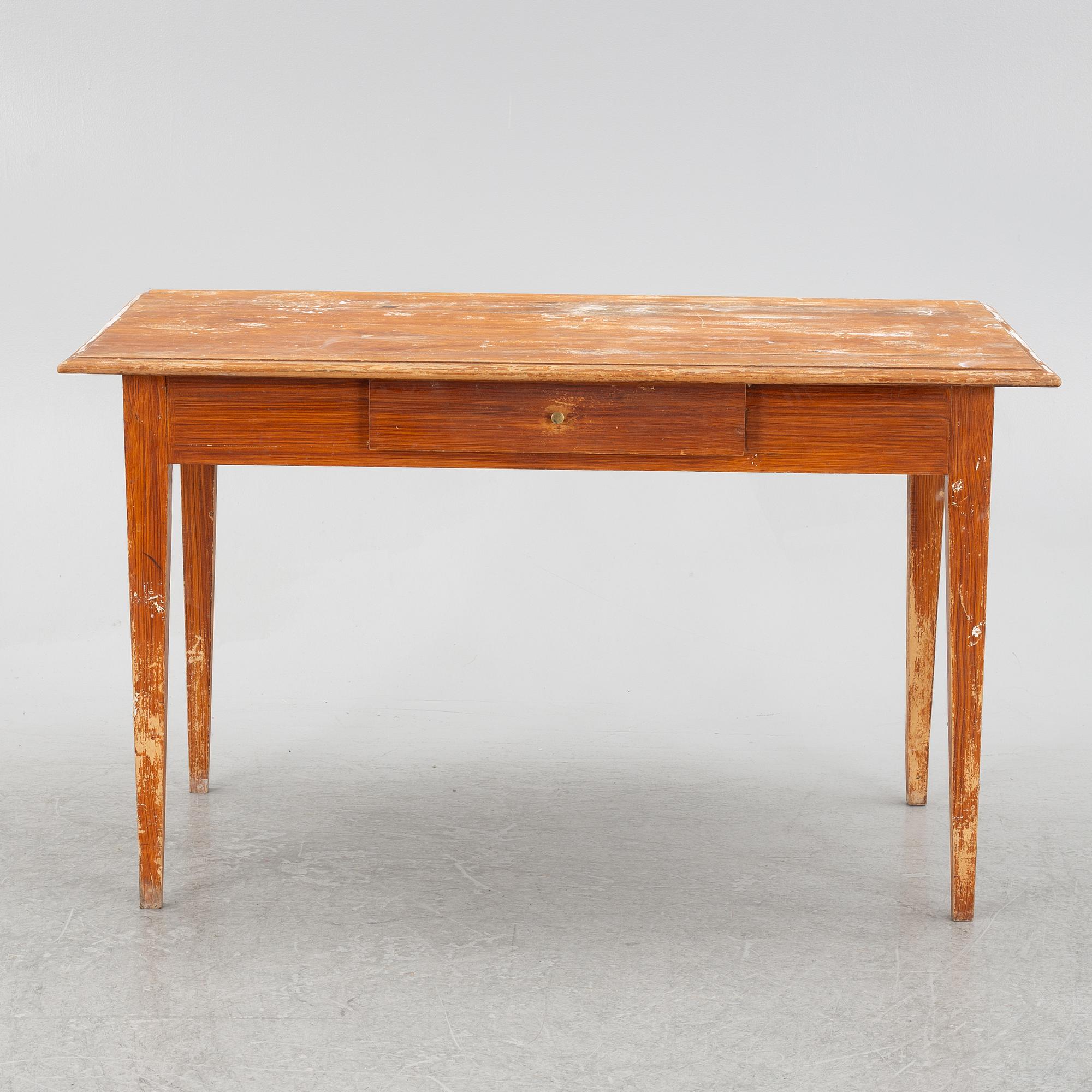 A table, early 20th Century.