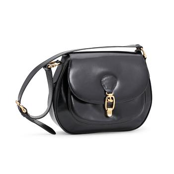 CÉLINE, a black leather shoulder bag.