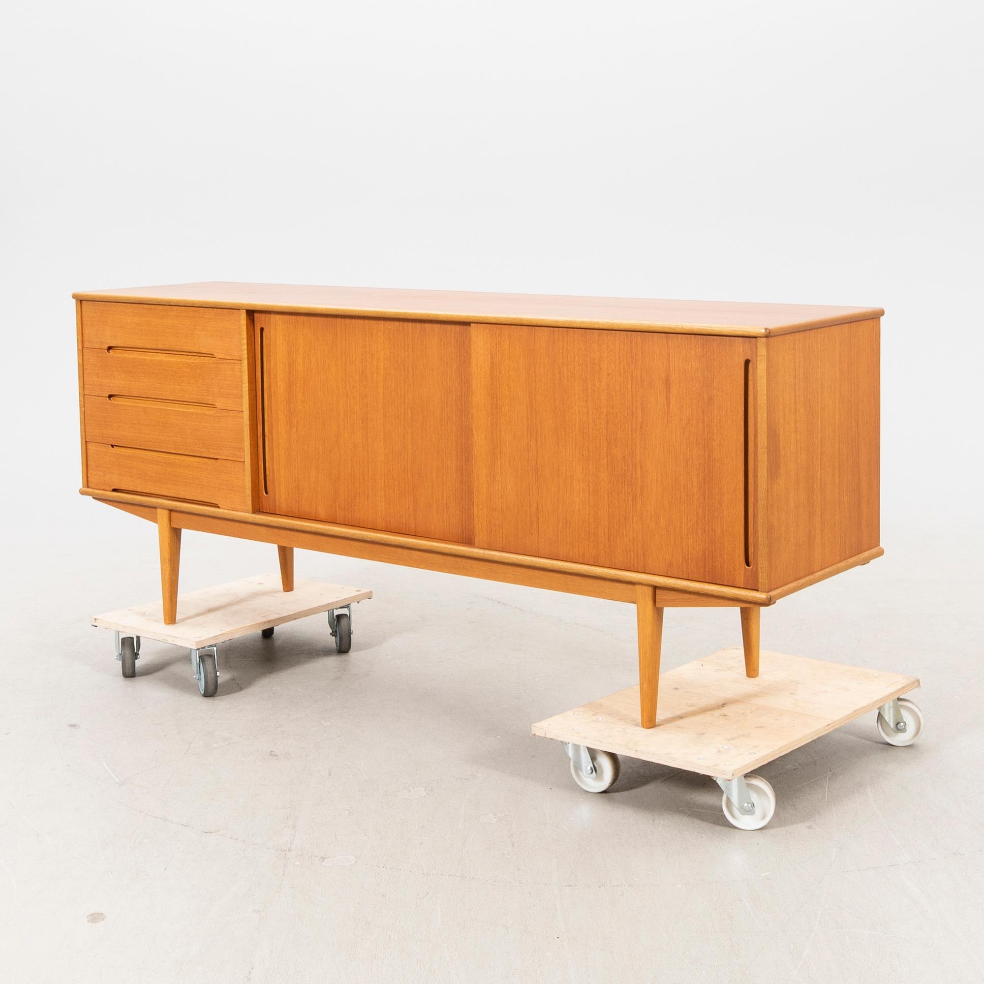 A 1960s teak sideboard.