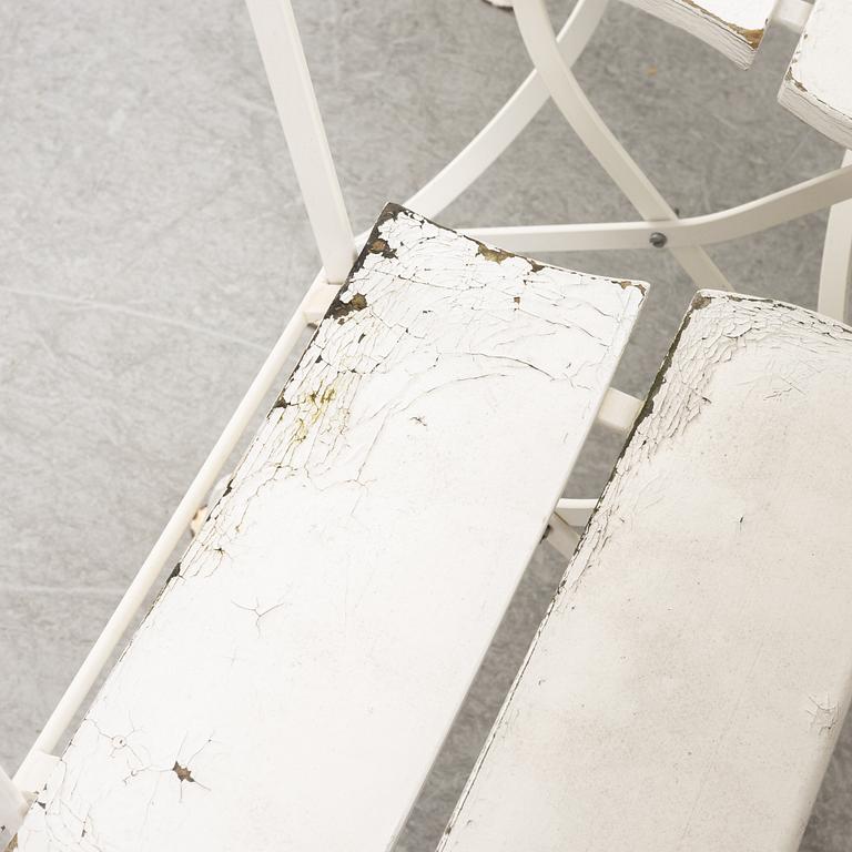 A set of seven garden chairs and two tables Byarums bruk, later part of the 20th century.