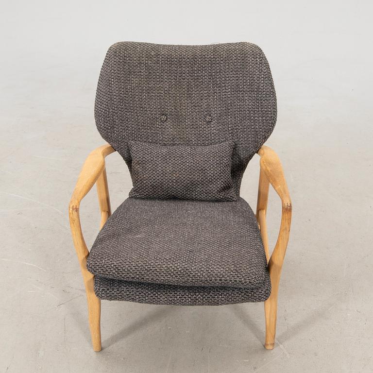 Armchair with armrests, modern manufacture.