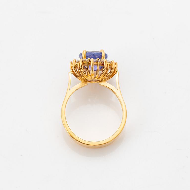 18K gold, sapphire and brilliant cut diamond ring.