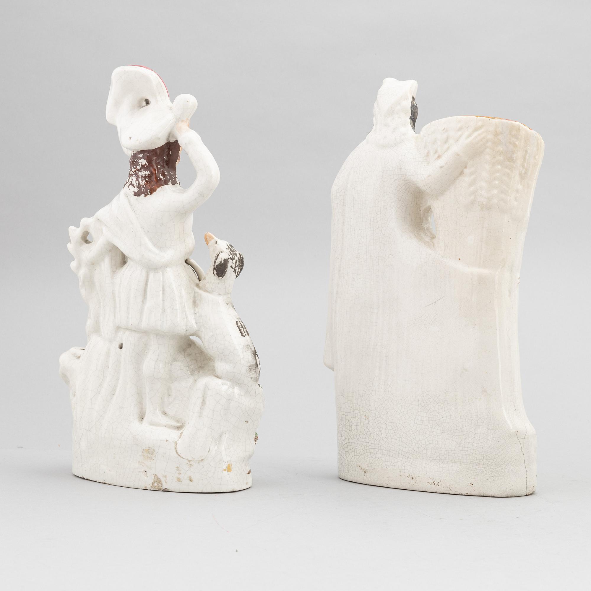 A set of eight English flintware figurines, 20th Century.