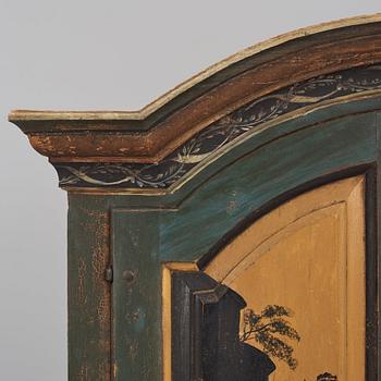 A polychrome-painted writing-cabinet attributed to J. Bäckström (1773-1837), dated 1828.