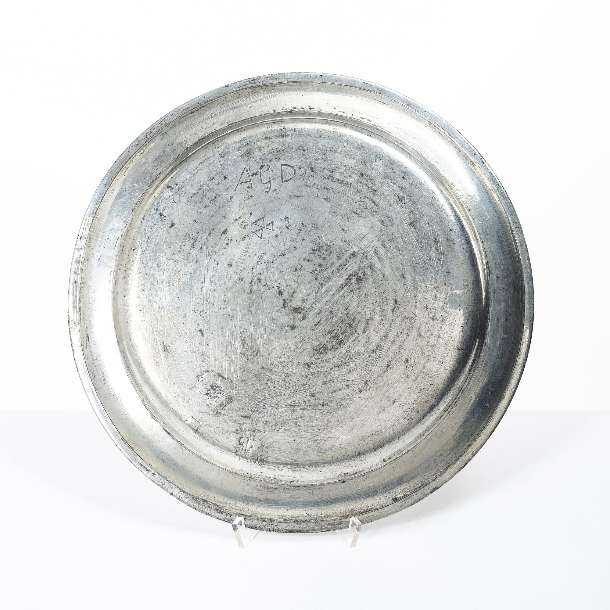 A silvered pewter charger by E. M. Hammarstrand, Falun 1776.