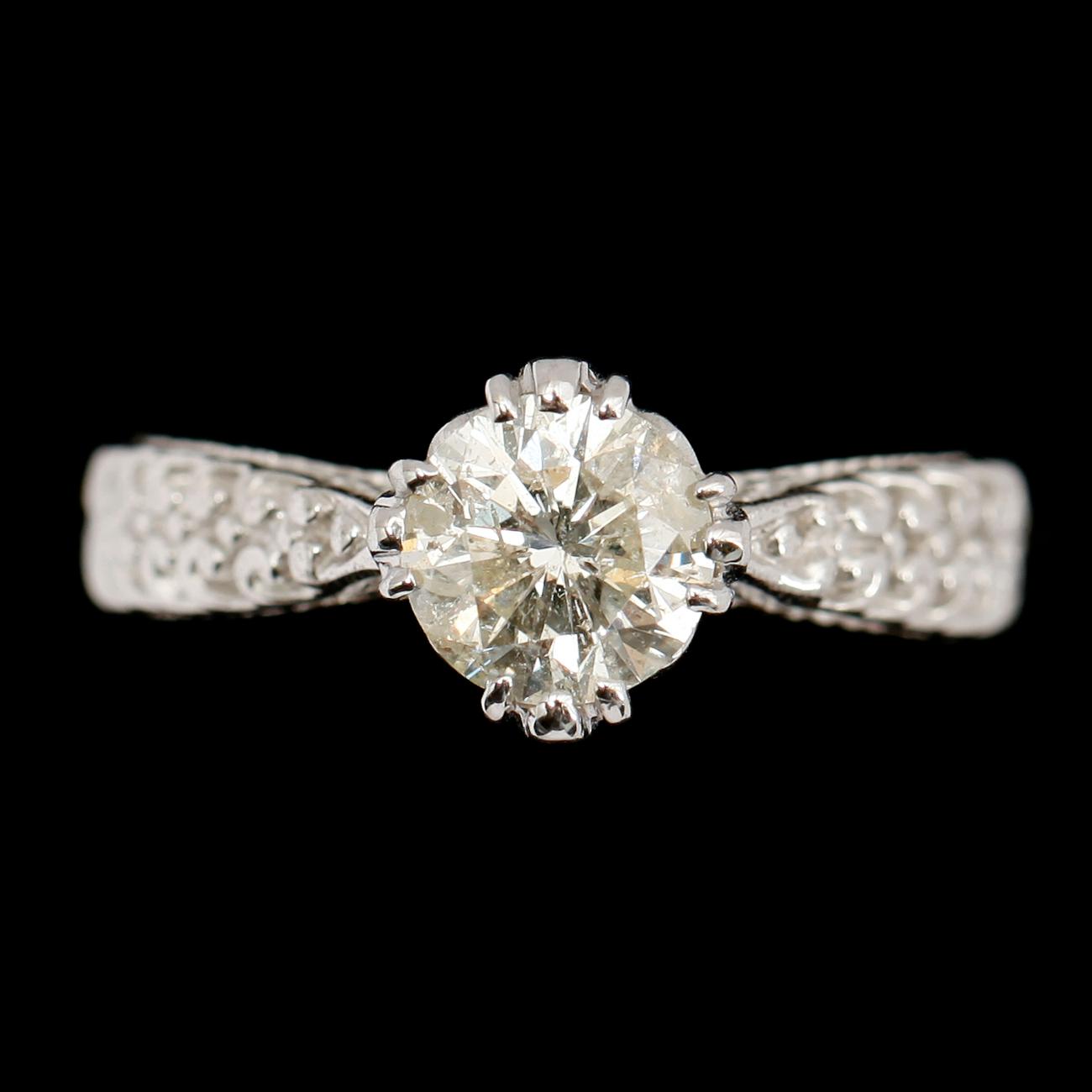RING, 14 k vitguld med solitär briljant 1.30 ct.