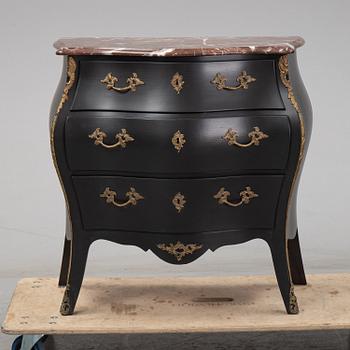 A mid 20th Century rococo style chest of drawers.
