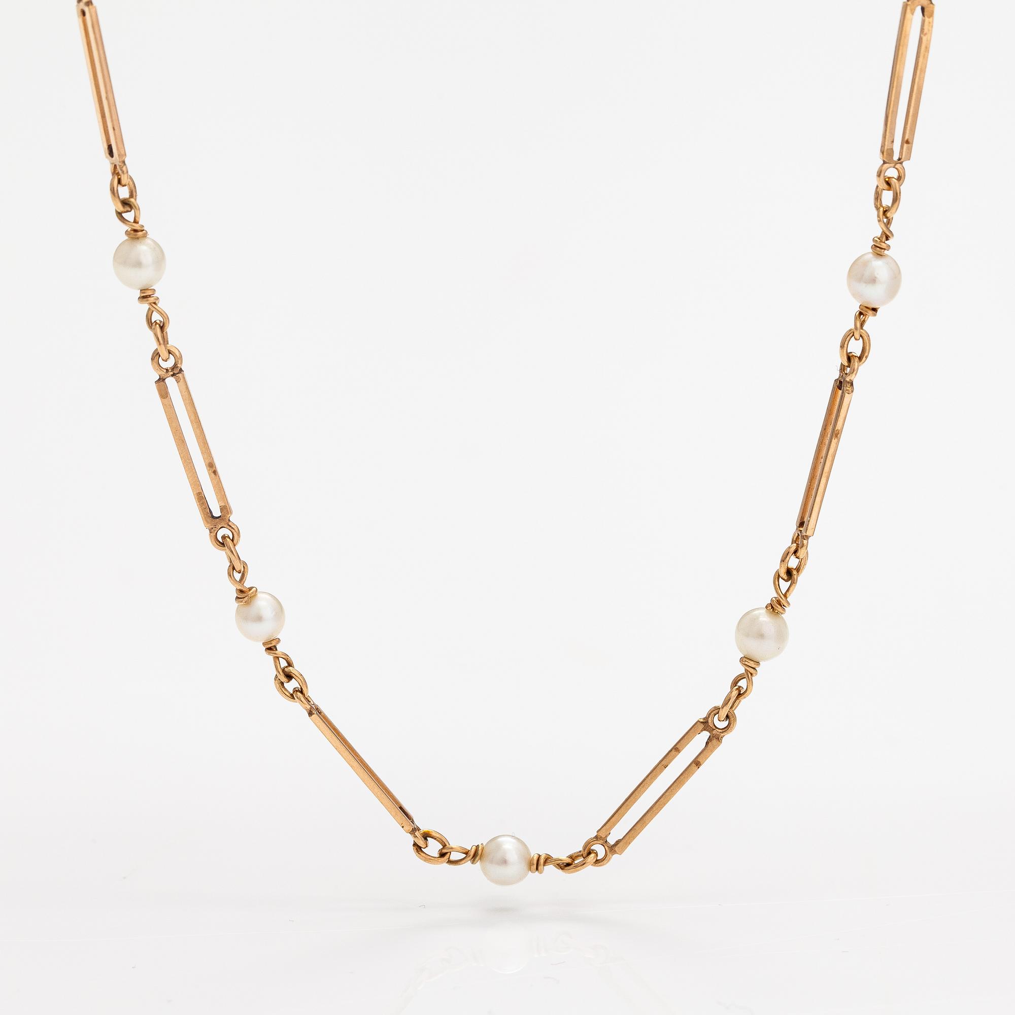 A 14K gold necklace with cuktured pearls. Westerback, Helsinki 1965.