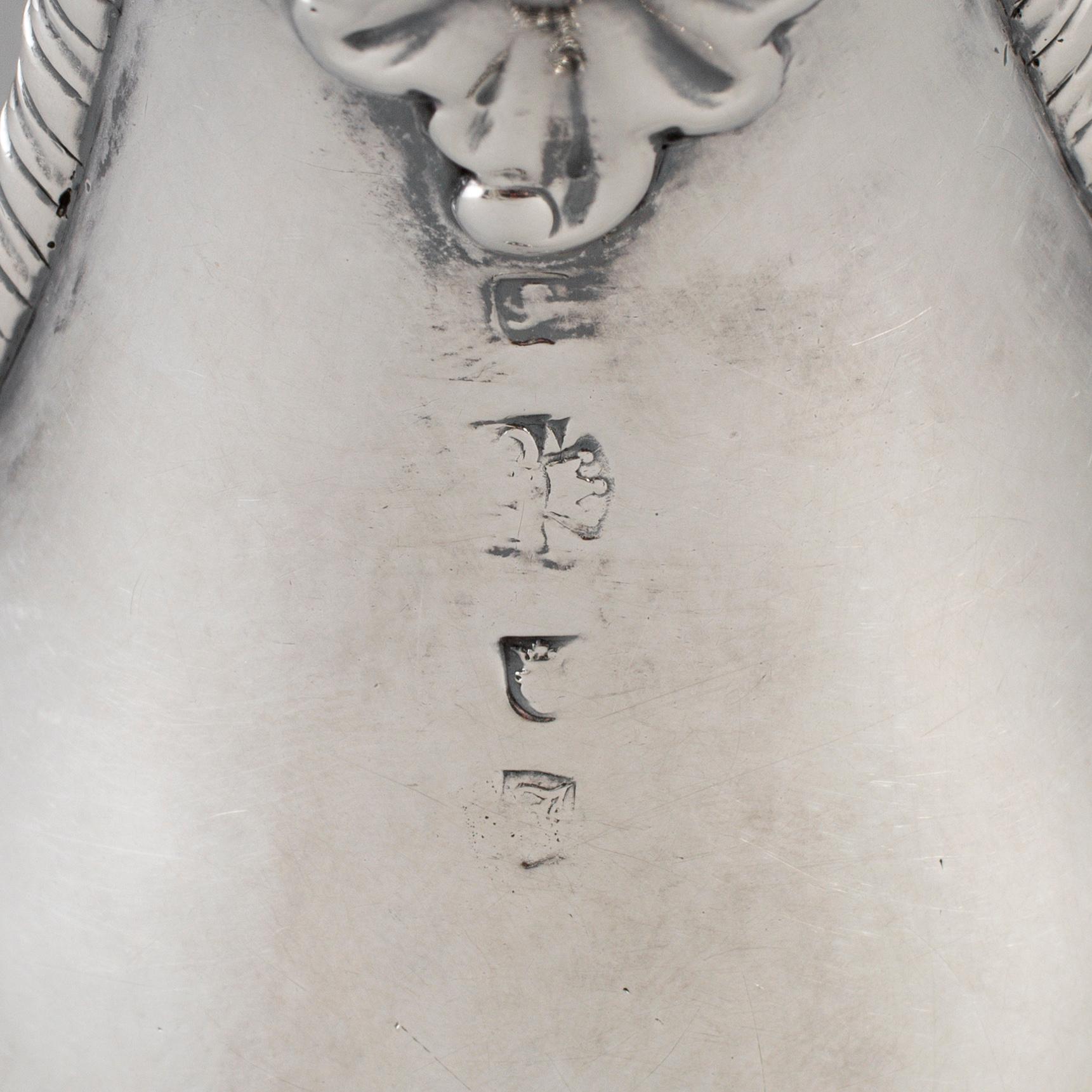 An English 18th century silver sauce-boat, unidentified makers mark, London 1764.