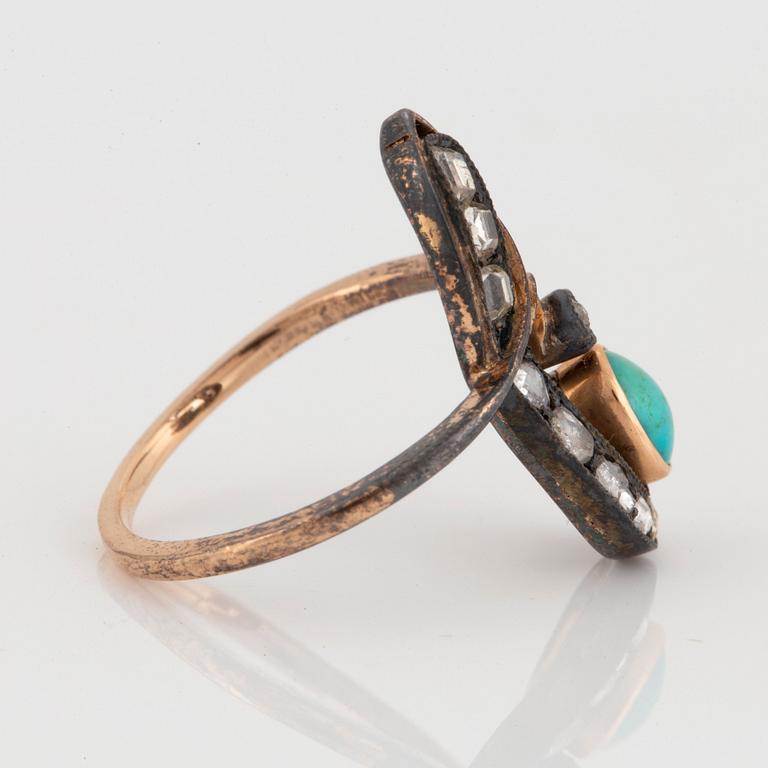 A 14K gold and silver Fedor Lorie ring set with a turquoise and old-cut diamonds.