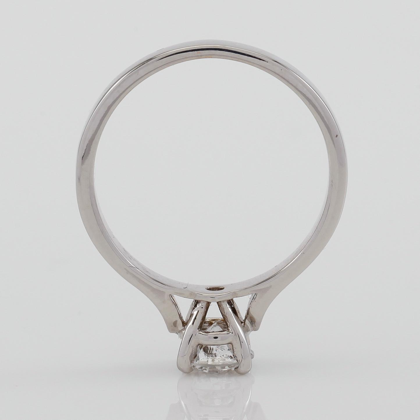 RING, 18K vitguld och solitär briljantslipad diamant ca 0.67 ct.