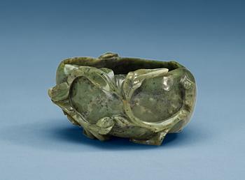 1288. A carved nephrite brush washer, Qing dynasty.