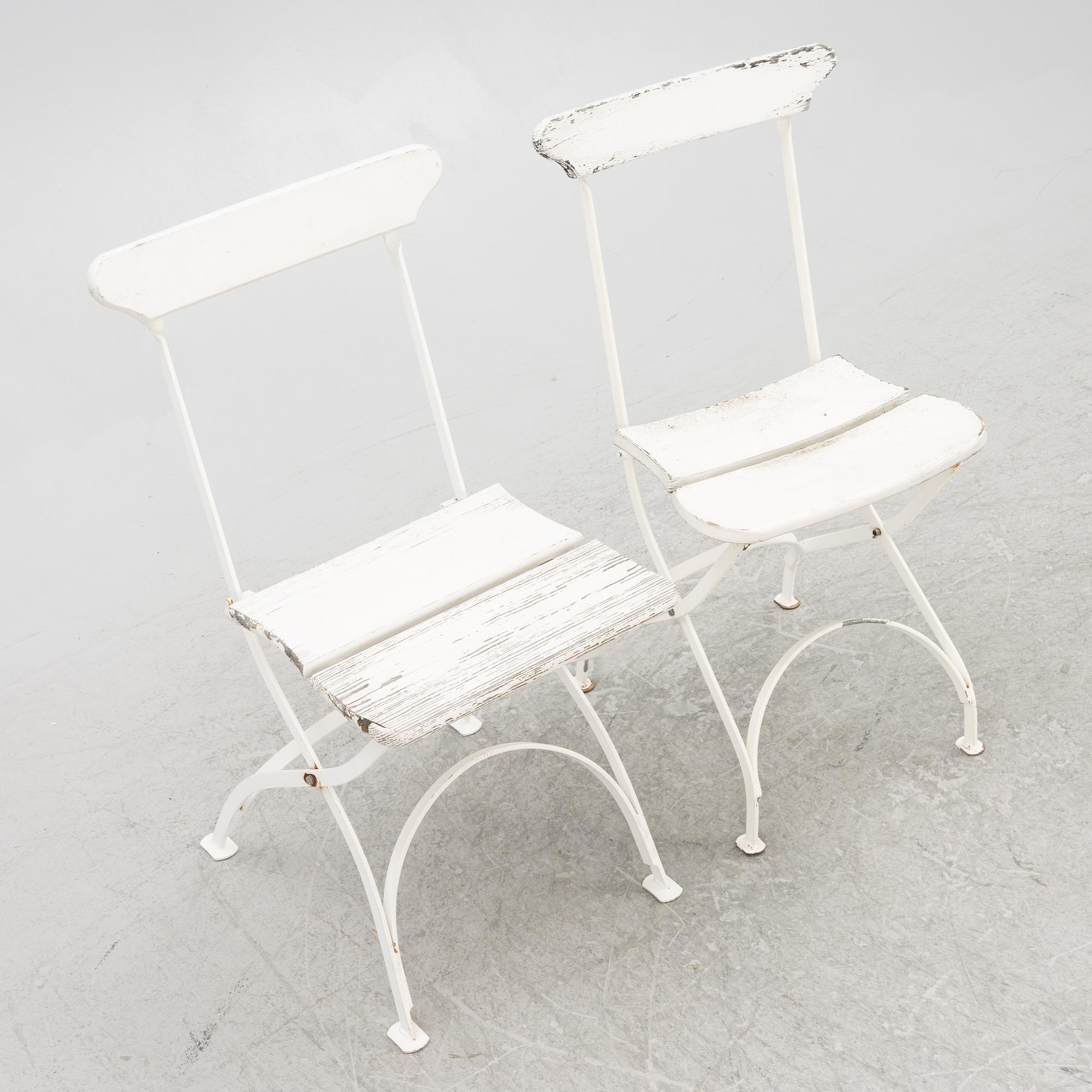 A set of seven garden chairs and two tables Byarums bruk, later part of the 20th century.