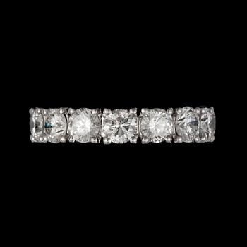 111. A brilliant-cut diamond eternity ring. Total carat weight circa 5. 00 cts. Quality circa G-H/SI.