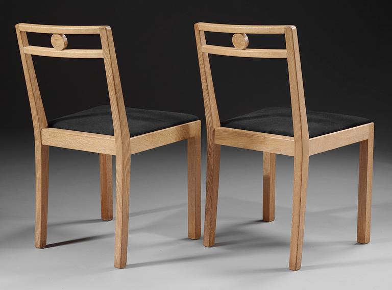 A pair of Axel-Einar Hjorth white chalked oak chairs 'Dagmar' by NK, Sweden 1935.