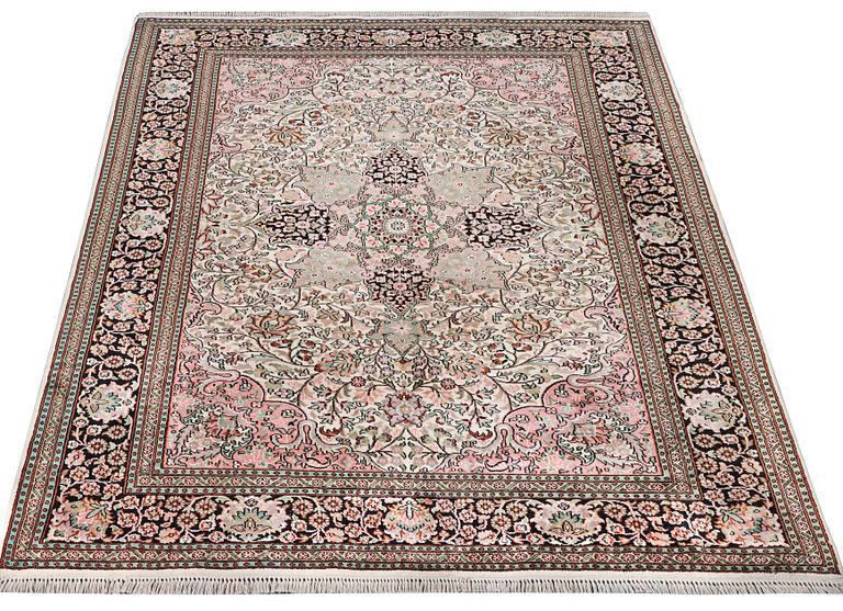 A silk Kashmir carpet, c. 267 x 185 cm.