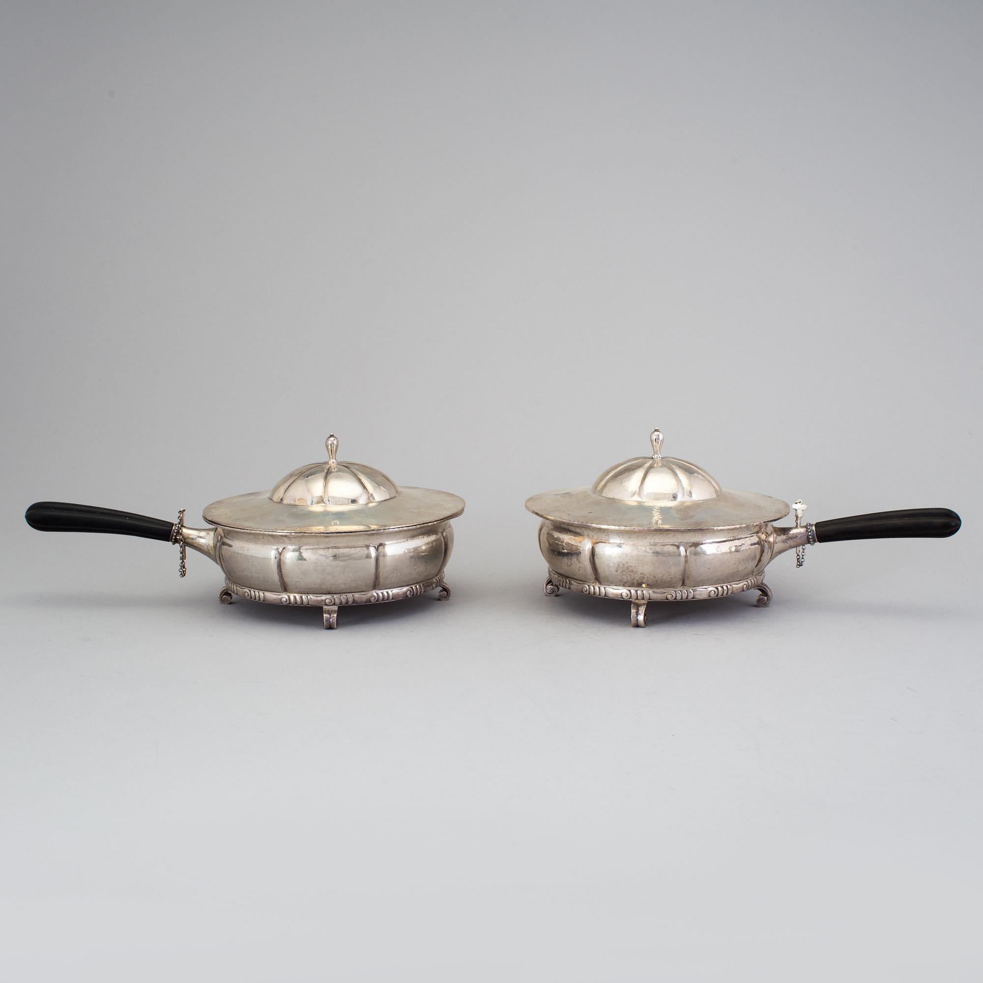 A matched pair of Swedish 20th century silver dishes and cover, mark of K Andersson, Stockholm 1917-1918.