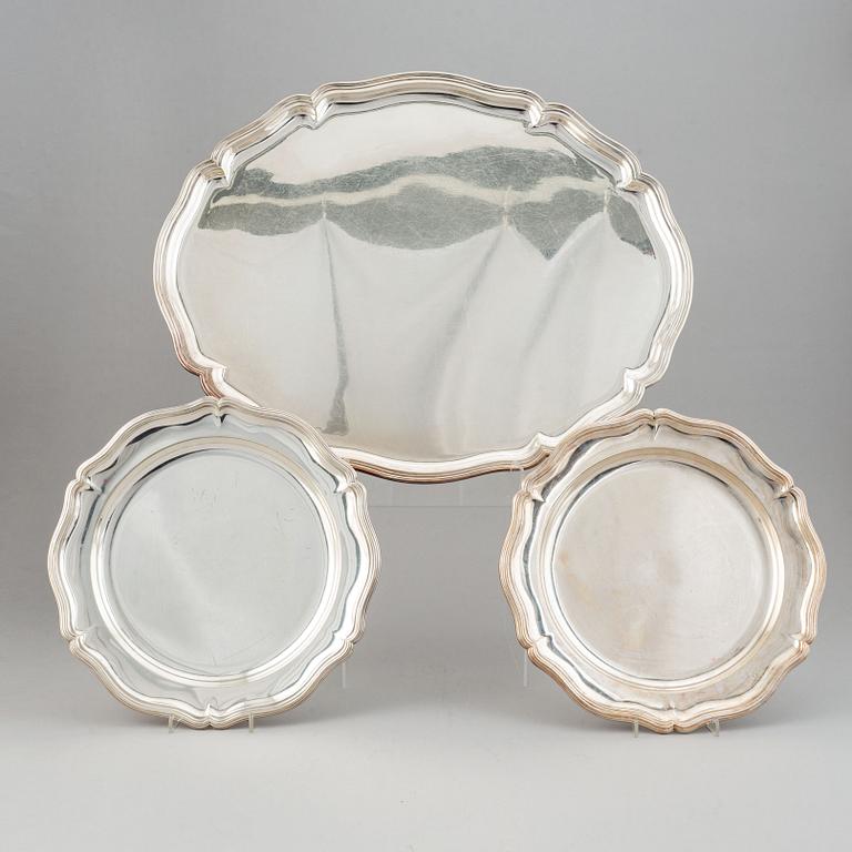 A 20th century silverd tray and two dishes. Louis XV-style.