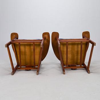 A pair of Arts and Crafts armchairs, early 20th century.