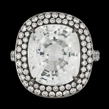 A large faceted white zircon, 16.09 cts,and brilliant cut diamond ring, tot. 1.64 ct.