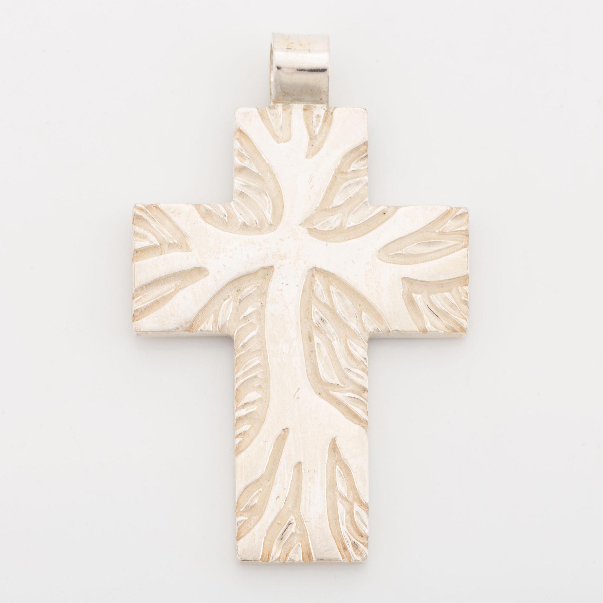 Rolf Karlsson a silver cross.