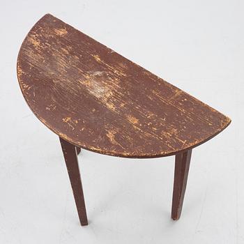 A 'half-moon table', 19th century.