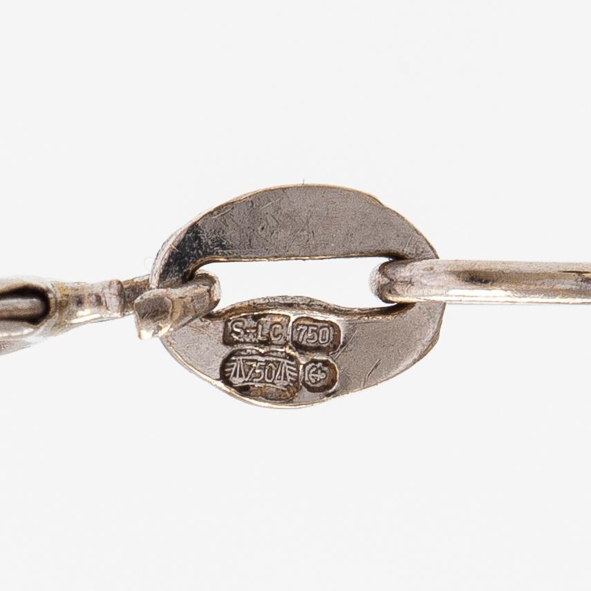Kaulakoru, 18K valkokultaa ja timantteja n. 0.56 ct yht.