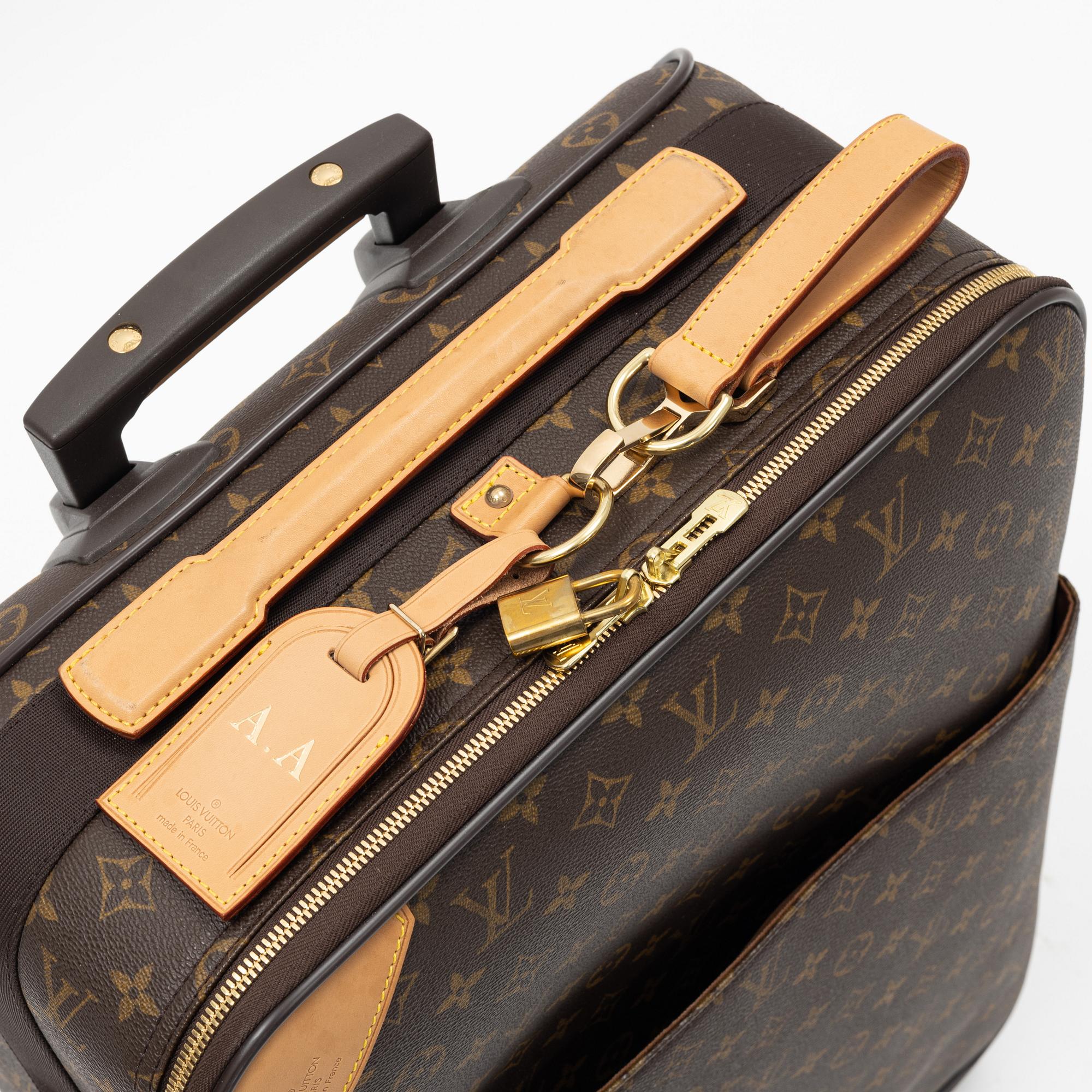 Louis Vuitton, a monogram canvas 'Pégase 60' suitcase, 2004.