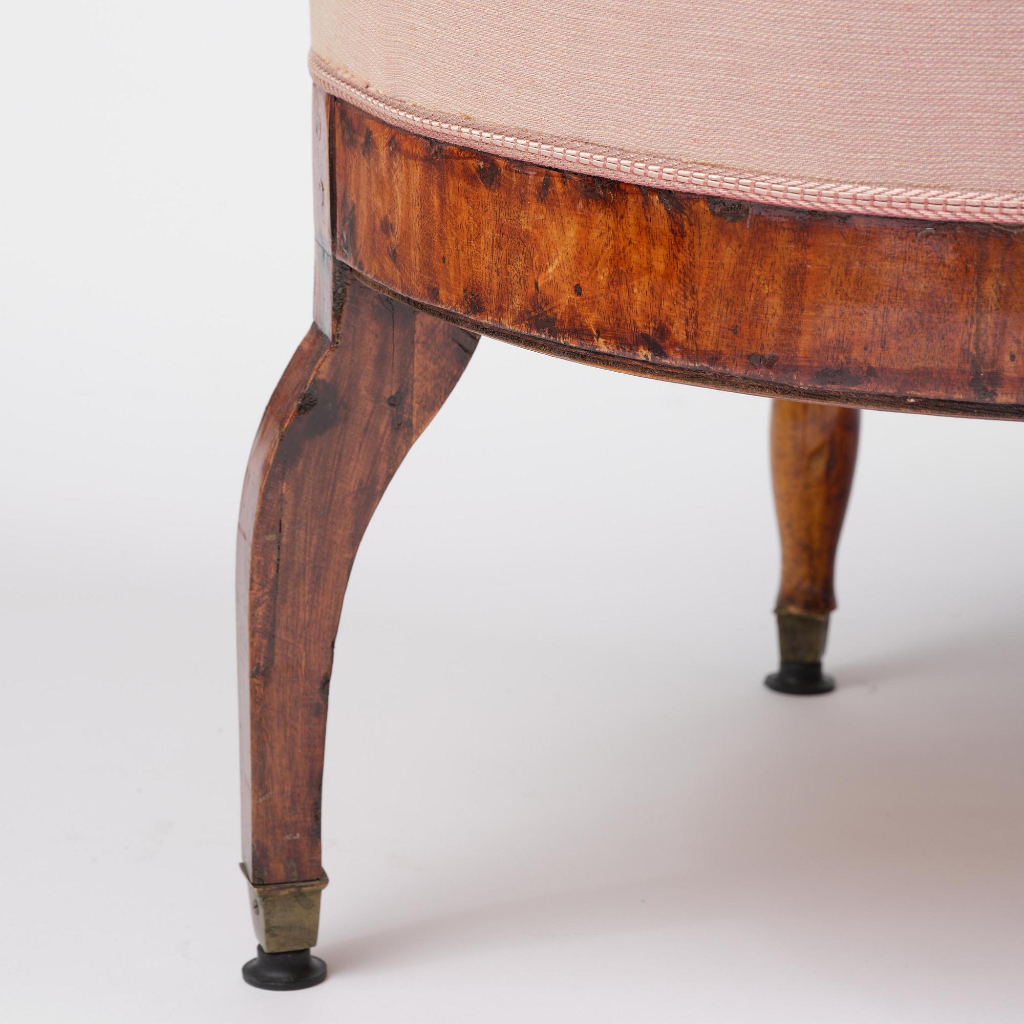 A pair of Baltic mahogany fauteuils, mid 19th century.