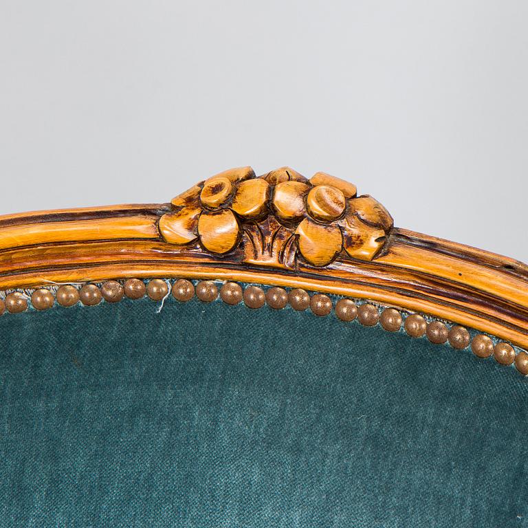 A pair of Louis XV style armchairs, mid-20th century.