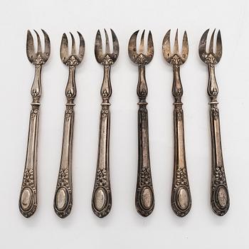 Emile Huignard, A set of six oyster forks, Silver (950), Paris, late 19th century.
