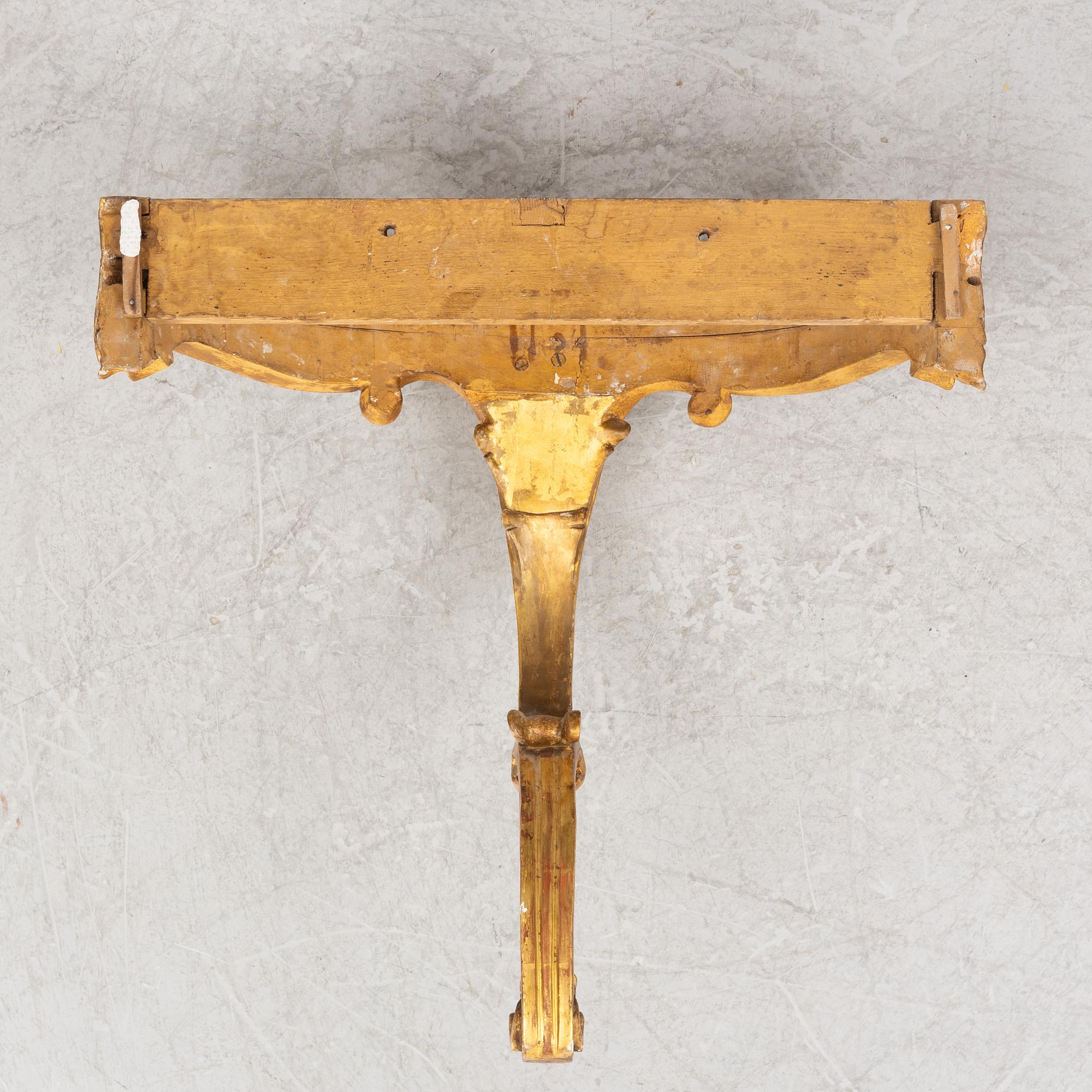 A Rococo style onsole table, circa 1900.