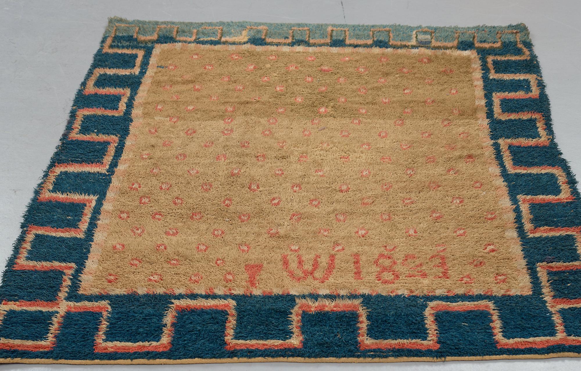A RYA BED COVER, possibly signed I W, dated 1823, ca 170-176,5 x 136,5-141,5 cm.