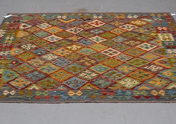 A kilim rug, ca 199 x 201 cm.