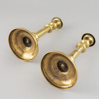 A pair of bronze Rmpire candlesticks, first half of he 19th century.