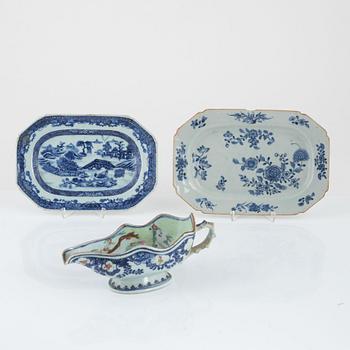 Two Chinese porcelain chargers and a sauceboat, Qing dynasty, Qianlong (1736-95).