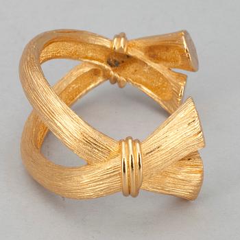 PUKUKORUSETTI, keltametallia, Margaretha Ley, Escada.