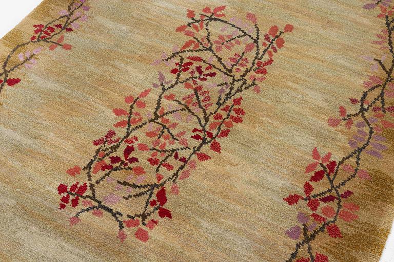 A knotted pile carpet, c. 275 x 177 cm, signed ES-FV-AJ.