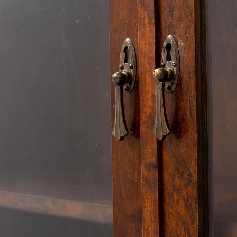A stained birch cabinet, 1920's.