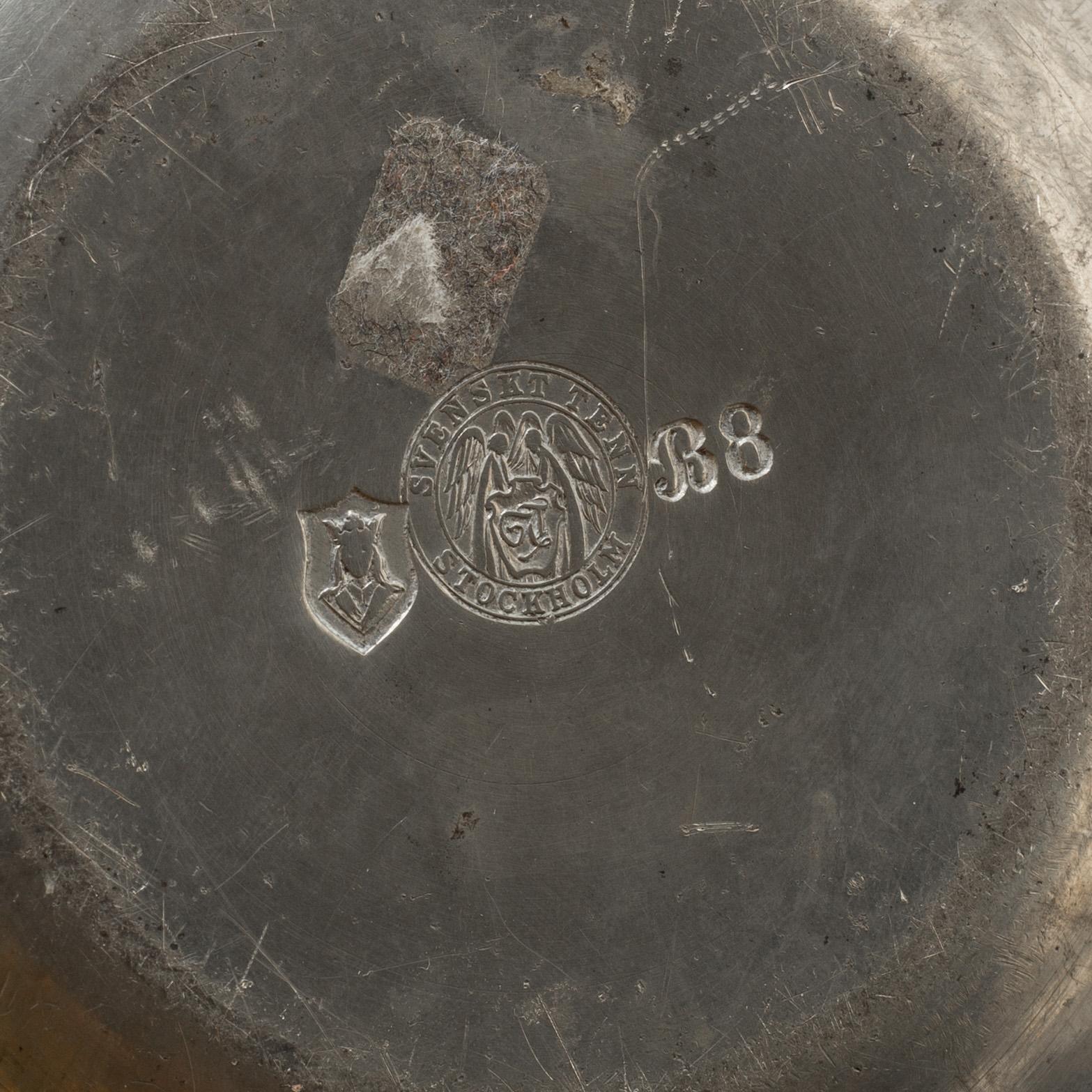 a pewter plate by Firma Svenskt Tenn Stockholm, 1928.