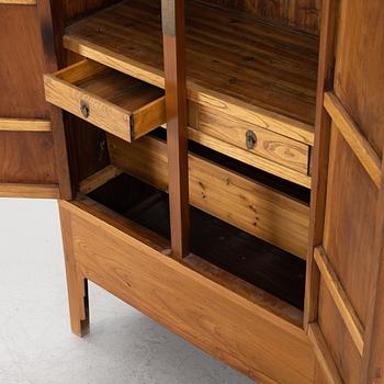 A Chinese hardwood cabinet, 20th century.