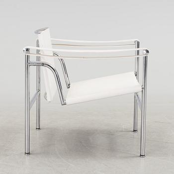 A "LC-1" ARMCHAIR DESIGNED BY LE CORBUSIER FOR CASSINA.