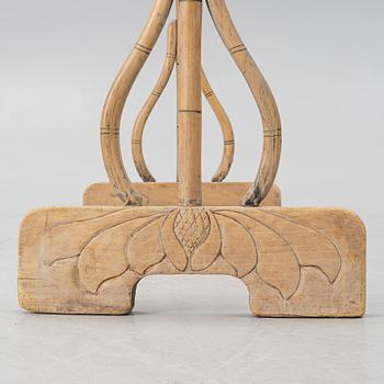 A Chinese bamboo and hardwood clothes rack, 20th century.