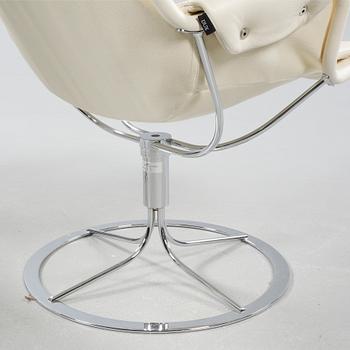 A pair of chairs, model Jetson, designed by Bruno Mathsson for Dux, made in the 21st century.