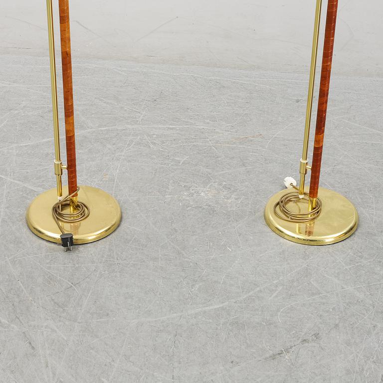 A pair of brass and leather floor lights, Örsjö industri, 21st century.