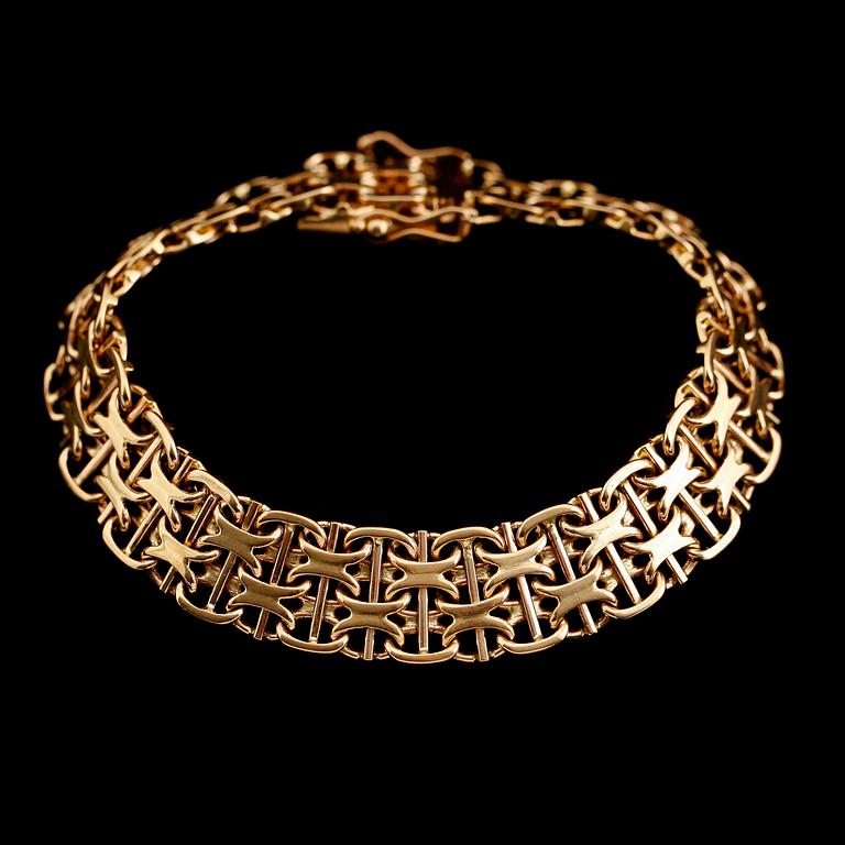 ARMBAND, 18 k guld, svenska stämplar, 1964. Vikt ca 32 g.