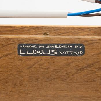 Uno & Östen Kristiansson, a large glass and oak, ceiling light, Luxus, Vittsjö.