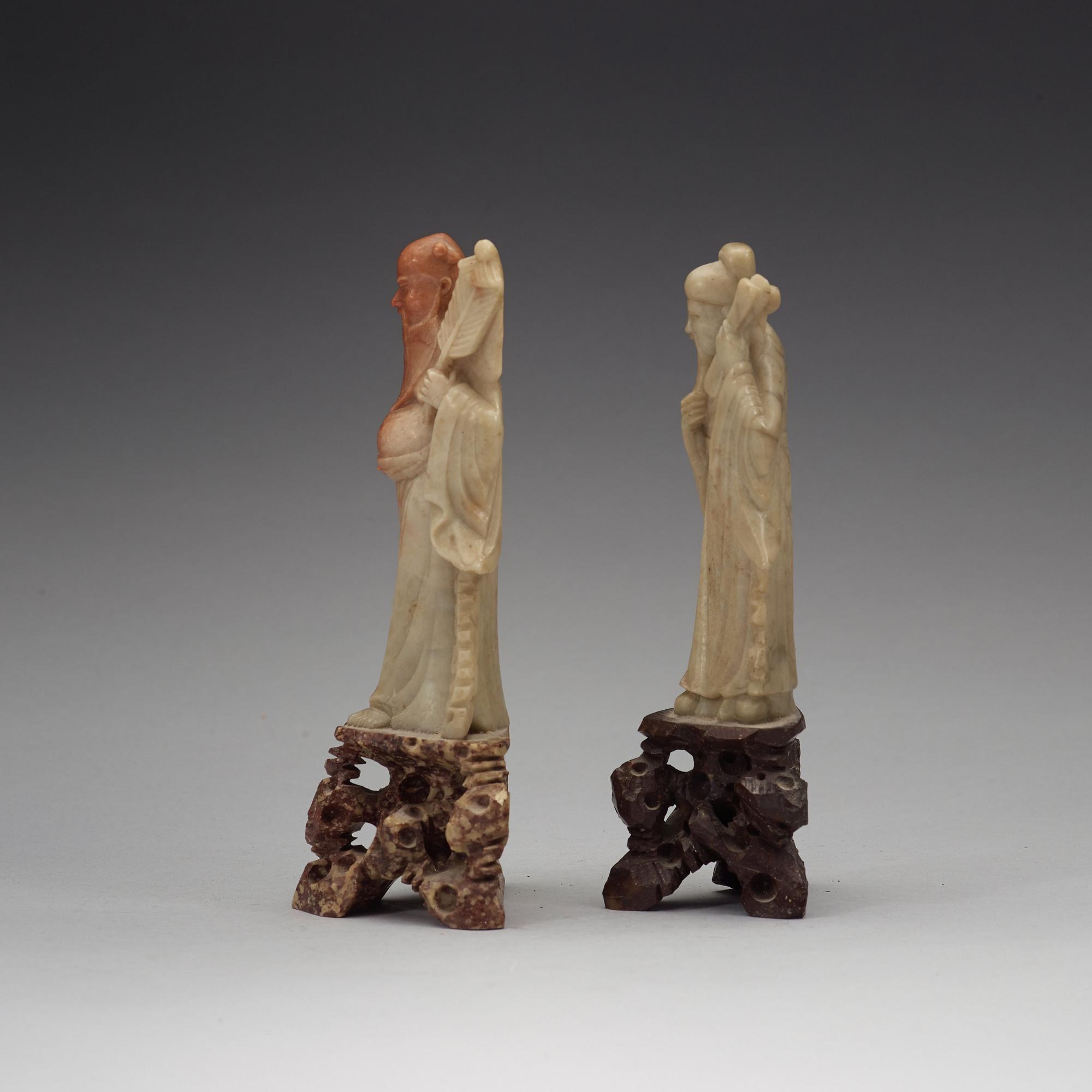 Two soapstone sculptures of immortals, late Qing dynasty, 19th Century.