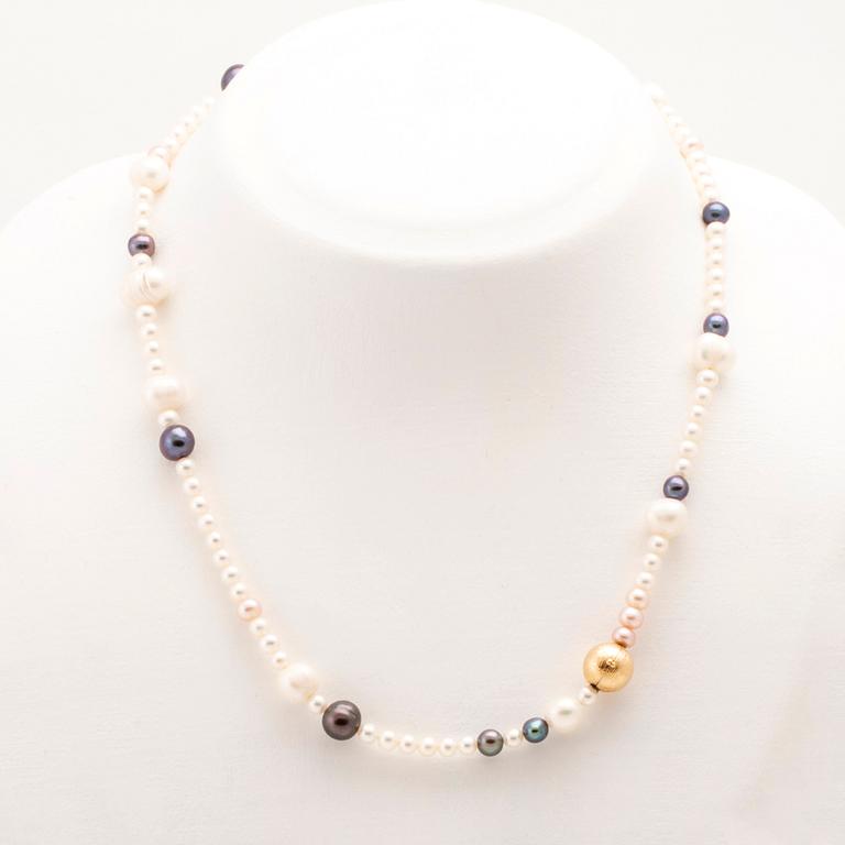 Ole Lynggaard, two cultured pearls necklaces and a bracelet with 18K gold clasp.